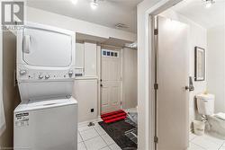 In-law suite with separate laundry and separate entrance through garage - 