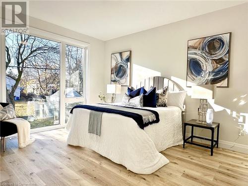 Bedroom featuring hardwood / wood-style flooring - 53 Giles Street, London, ON - Indoor Photo Showing Bedroom