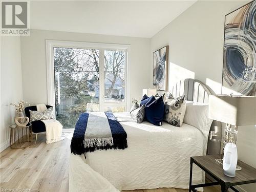 Bedroom featuring hardwood / wood-style floors - 53 Giles Street, London, ON - Indoor Photo Showing Bedroom