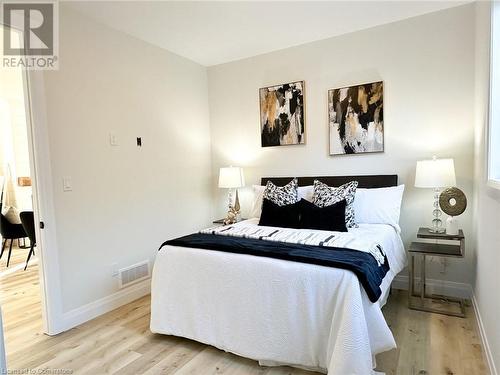 Bedroom featuring light hardwood / wood-style floors - 53 Giles Street, London, ON - Indoor Photo Showing Bedroom