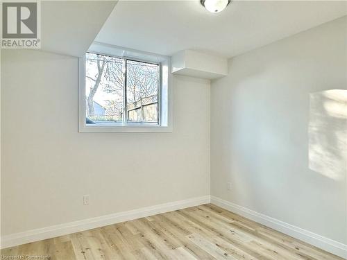 Additional living space with light wood-type flooring - 53 Giles Street, London, ON - Indoor Photo Showing Other Room