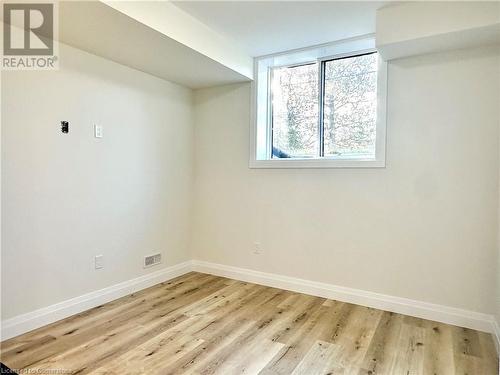 Unfurnished room with light wood-type flooring - 53 Giles Street, London, ON - Indoor Photo Showing Other Room