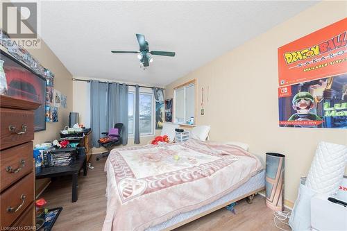 Bedroom with ceiling fan, a textured ceiling, and light wood-type flooring - 9202 9Th Line, Halton Hills, ON - Indoor Photo Showing Bedroom