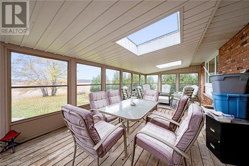 Sunroom / solarium featuring lofted ceiling with skylight, a healthy amount of sunlight, and wood ceiling - 9202 9Th Line, Halton Hills, ON - Outdoor With Deck Patio Veranda With Exterior