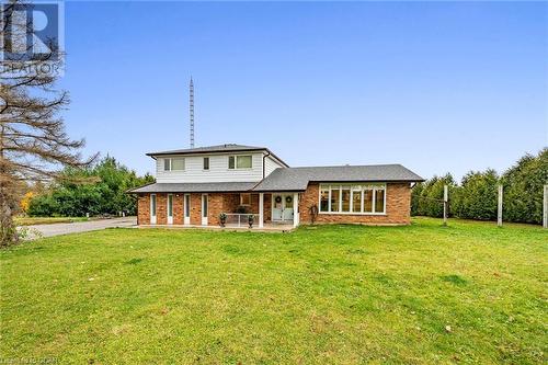 Rear view of house with a yard - 9202 9Th Line, Halton Hills, ON - Outdoor With Deck Patio Veranda