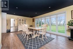 Dining area featuring hardwood / wood-style floors - 