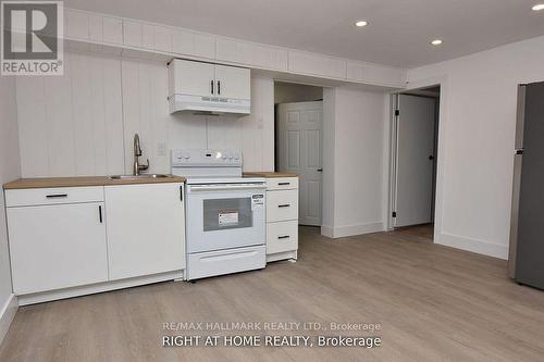 Bsmt-1 - 293 Churchill Avenue, Toronto, ON - Indoor Photo Showing Kitchen