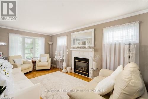 1 Shaver Road, St. Catharines (462 - Rykert/Vansickle), ON - Indoor Photo Showing Living Room With Fireplace