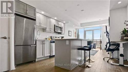 606 - 7711 Green Vista Gate, Niagara Falls (220 - Oldfield), ON - Indoor Photo Showing Kitchen With Upgraded Kitchen