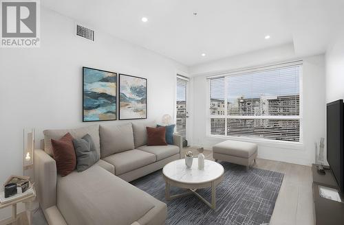 Virtually staged photo for the living room - 1925 Enterprise Way Unit# 205, Kelowna, BC - Indoor Photo Showing Living Room