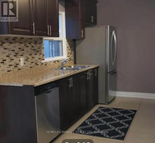 121 Mcmurchy Avenue S, Brampton, ON - Indoor Photo Showing Kitchen With Double Sink