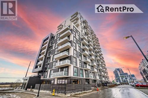 1305 - 345 Wheat Boom Drive, Oakville, ON - Outdoor With Balcony With Facade