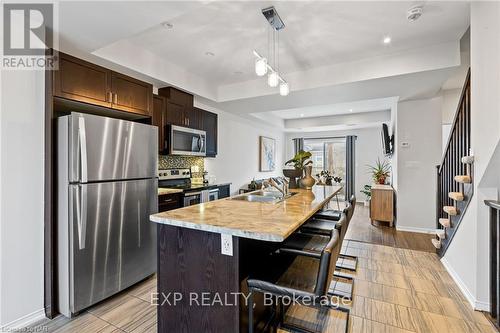 5060 Serena Drive Drive, Lincoln (982 - Beamsville), ON - Indoor Photo Showing Kitchen With Stainless Steel Kitchen With Double Sink With Upgraded Kitchen