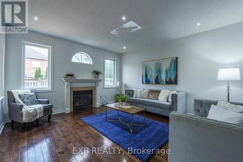 11 Cairnburg Drive, Brampton, ON - Indoor Photo Showing Living Room With Fireplace