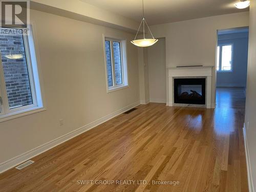 Upper - 27 Keyworth Crescent, Brampton, ON - Indoor Photo Showing Living Room With Fireplace