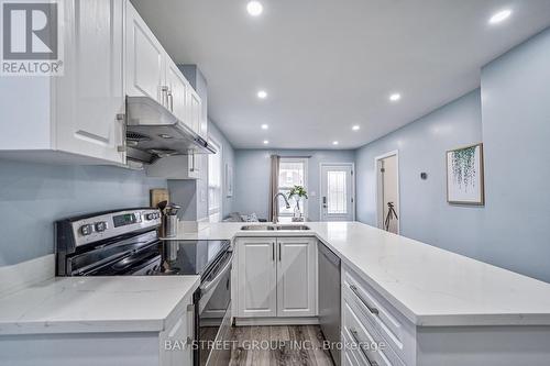 5241 Kitchener Street, Niagara Falls, ON - Indoor Photo Showing Kitchen With Double Sink With Upgraded Kitchen