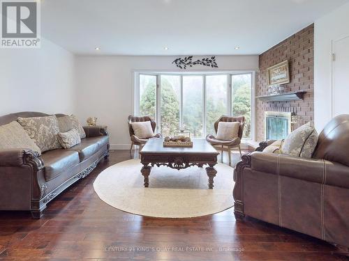 22 Overton Crescent, Toronto, ON - Indoor Photo Showing Living Room With Fireplace