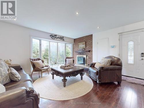 22 Overton Crescent, Toronto, ON - Indoor Photo Showing Living Room With Fireplace