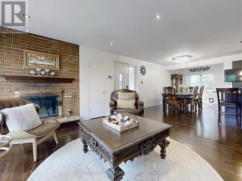 22 Overton Crescent, Toronto, ON - Indoor Photo Showing Living Room With Fireplace