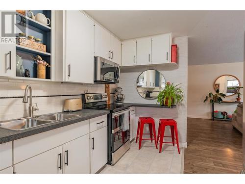 709 Hermia Crescent, Trail, BC - Indoor Photo Showing Kitchen With Double Sink