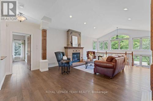 132 Country Carriage Way, Ottawa, ON - Indoor Photo Showing Living Room With Fireplace