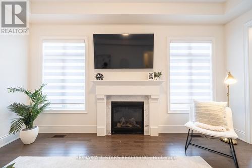 135 Steam Whistle Drive, Whitchurch-Stouffville, ON - Indoor Photo Showing Living Room With Fireplace