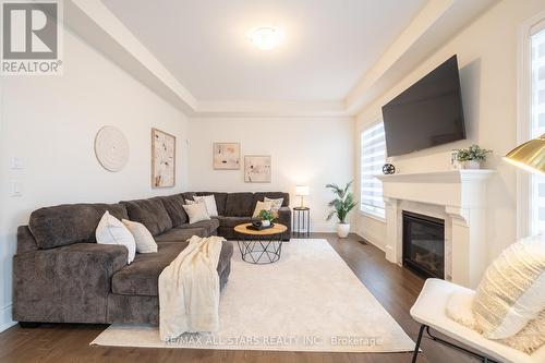 135 Steam Whistle Drive, Whitchurch-Stouffville, ON - Indoor Photo Showing Living Room With Fireplace