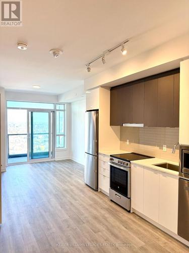 2309A - 30 Upper Mall Way Drive, Vaughan, ON - Indoor Photo Showing Kitchen With Stainless Steel Kitchen