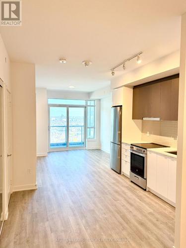 2309A - 30 Upper Mall Way Drive, Vaughan, ON - Indoor Photo Showing Kitchen With Stainless Steel Kitchen