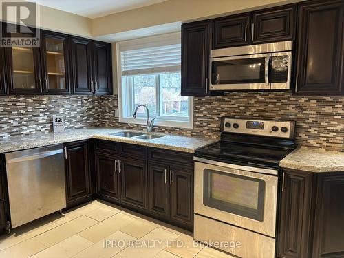 54 - 2145 Sherobee Road, Mississauga, ON - Indoor Photo Showing Kitchen With Double Sink With Upgraded Kitchen