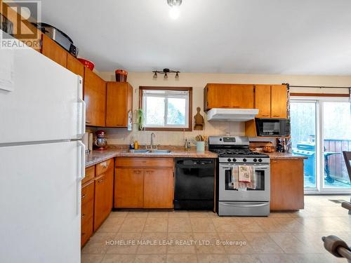 2009 Sideroad 10, Milton, ON - Indoor Photo Showing Kitchen With Double Sink