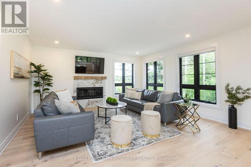 1590 Century Road E, Ottawa, ON - Indoor Photo Showing Living Room With Fireplace