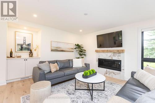 1590 Century Road E, Ottawa, ON - Indoor Photo Showing Living Room With Fireplace