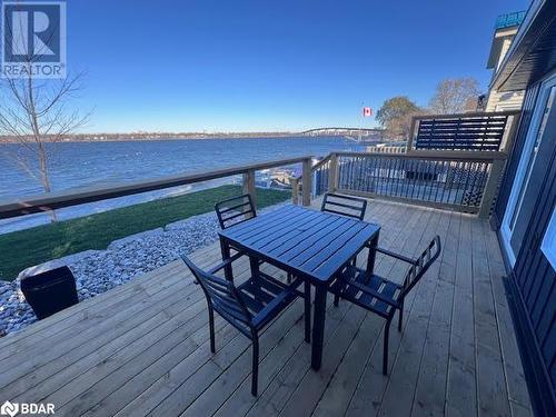 Wooden terrace featuring a water view - 80 Ridley Street, Prince Edward County, ON - Outdoor With Body Of Water With Deck Patio Veranda With View