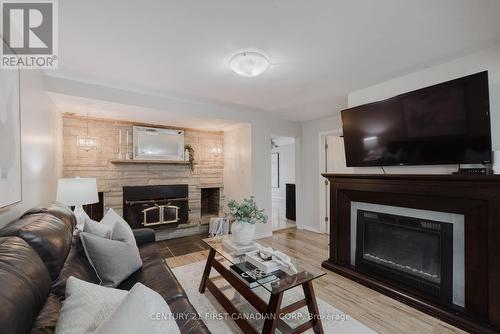 113 Appel Street, London, ON - Indoor Photo Showing Living Room With Fireplace