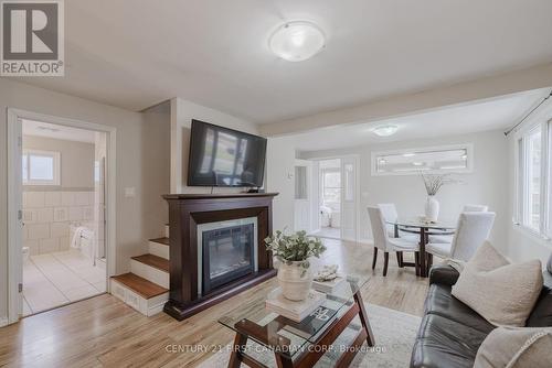 113 Appel Street, London, ON - Indoor Photo Showing Living Room With Fireplace