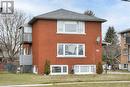 View of side of home featuring a lawn - 524 Krug Street, Kitchener, ON  - Outdoor With Exterior 