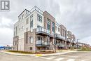 101 - 1565 Rose Way, Milton, ON  - Outdoor With Balcony With Facade 