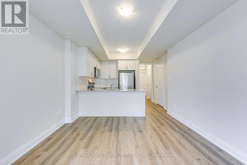 101 - 1565 Rose Way, Milton, ON - Indoor Photo Showing Kitchen