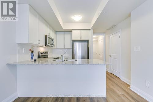 101 - 1565 Rose Way, Milton, ON - Indoor Photo Showing Kitchen With Stainless Steel Kitchen