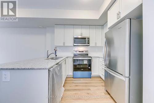 101 - 1565 Rose Way, Milton, ON - Indoor Photo Showing Kitchen With Stainless Steel Kitchen With Upgraded Kitchen