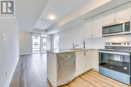 101 - 1565 Rose Way, Milton, ON - Indoor Photo Showing Kitchen