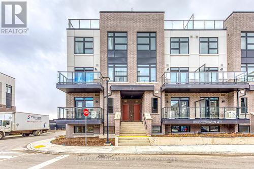 101 - 1565 Rose Way, Milton, ON - Outdoor With Balcony With Facade