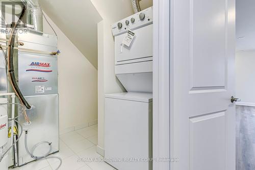 101 - 1565 Rose Way, Milton, ON - Indoor Photo Showing Laundry Room