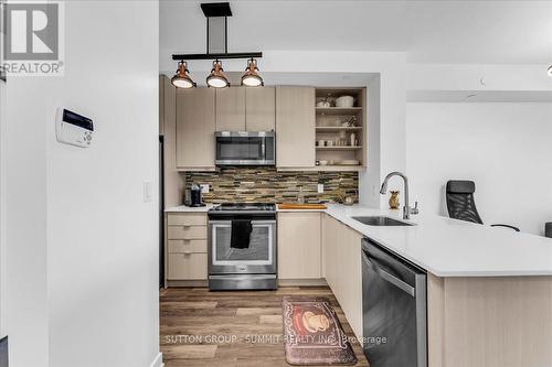 1010 - 4633 Glen Erin Drive N, Mississauga, ON - Indoor Photo Showing Kitchen With Stainless Steel Kitchen With Upgraded Kitchen