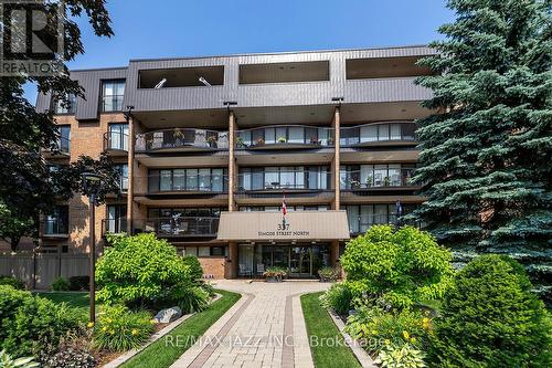 201 - 337 Simcoe Street N, Oshawa (O'Neill), ON - Outdoor With Balcony With Facade