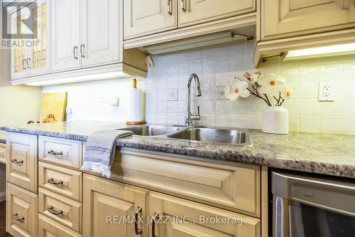 201 - 337 Simcoe Street N, Oshawa (O'Neill), ON - Indoor Photo Showing Kitchen With Double Sink