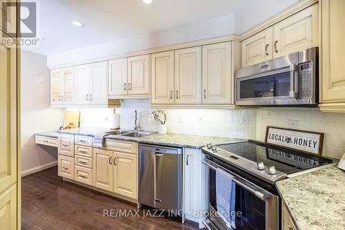 201 - 337 Simcoe Street N, Oshawa (O'Neill), ON - Indoor Photo Showing Kitchen With Double Sink