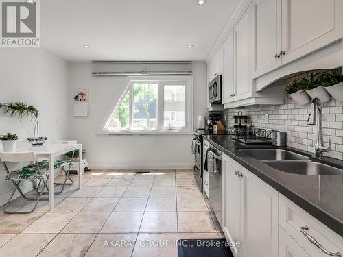 25 Flaming Rose Way, Toronto, ON - Indoor Photo Showing Kitchen With Double Sink