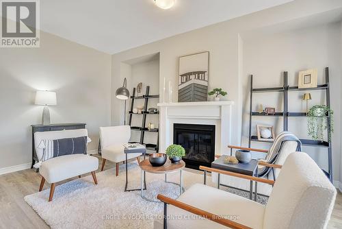 206 Cubitt Street, Clearview, ON - Indoor Photo Showing Living Room With Fireplace